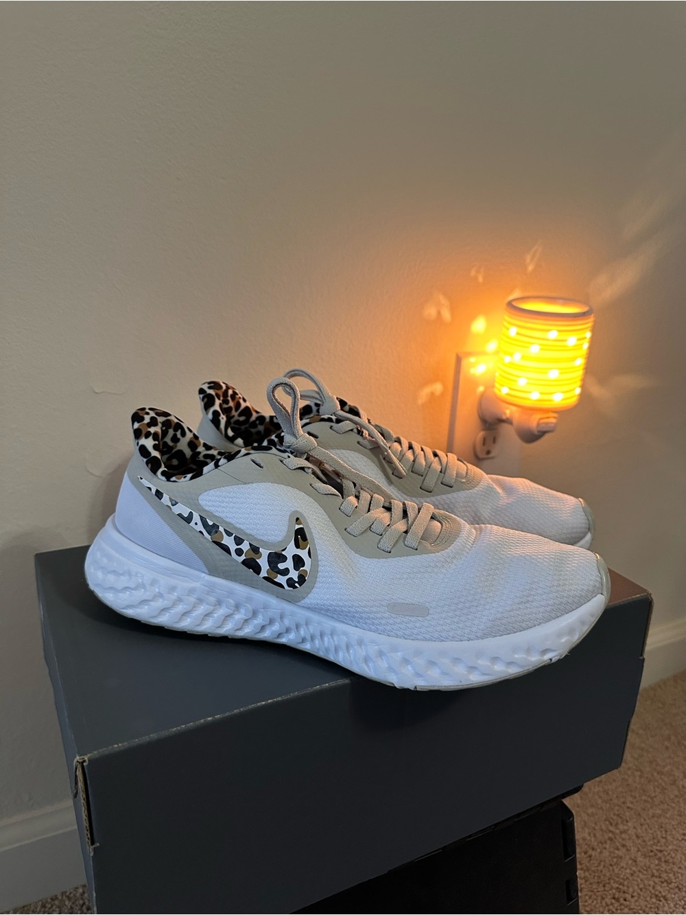 Nike Revolution 5 Premium 
Women’s White Running Shoes with Leopard Swoosh, 9.5
